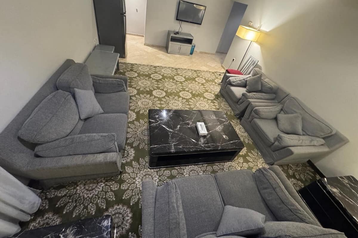 Standard Suite | Living area | Flat-screen TV