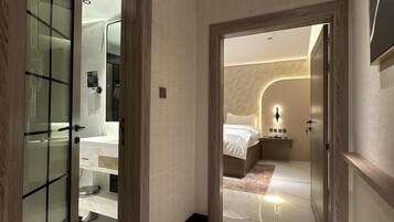 Suite Eksekutif, 1 kamar tidur | Area keluarga | TV layar datar