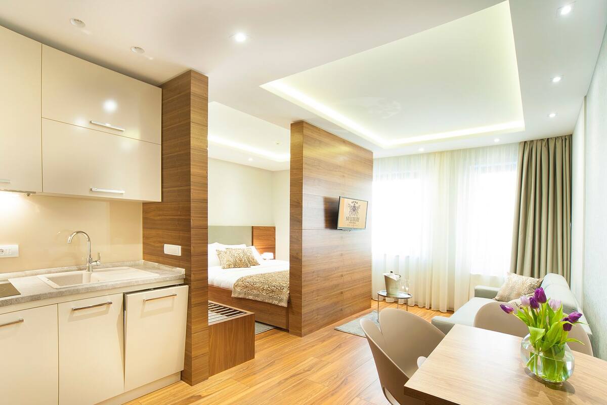 Suite Superior | Area soggiorno | TV a schermo piatto