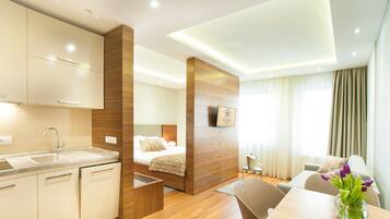 Superior Suite | Living area | Flat-screen TV