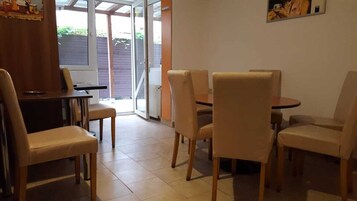 Fridge, microwave, coffee grinder, cookware/dishes/utensils