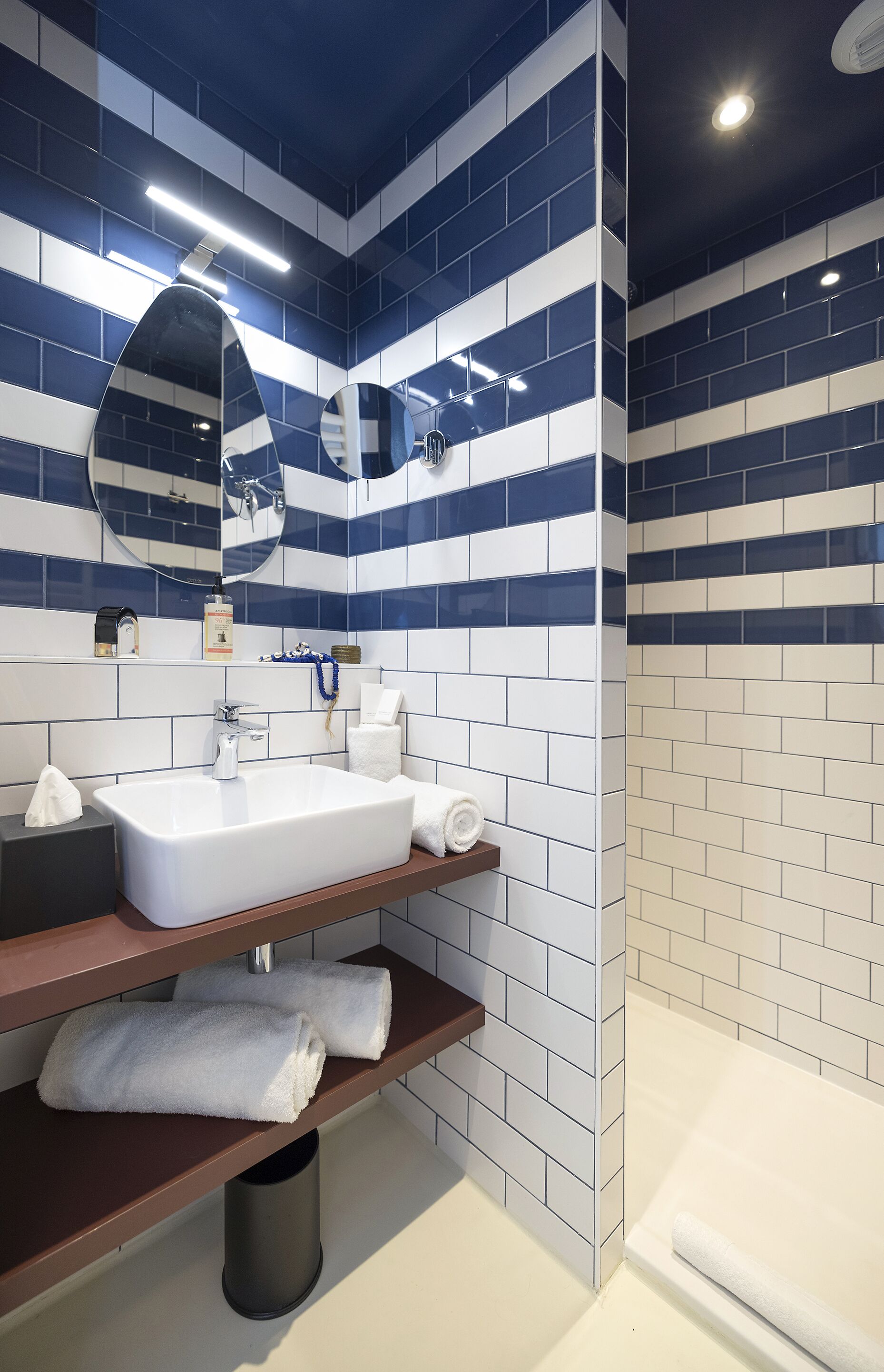 shower, hair dryer, bathrobes, slippers