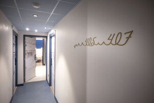 A hallway with a wall sign that reads "fun4all".
