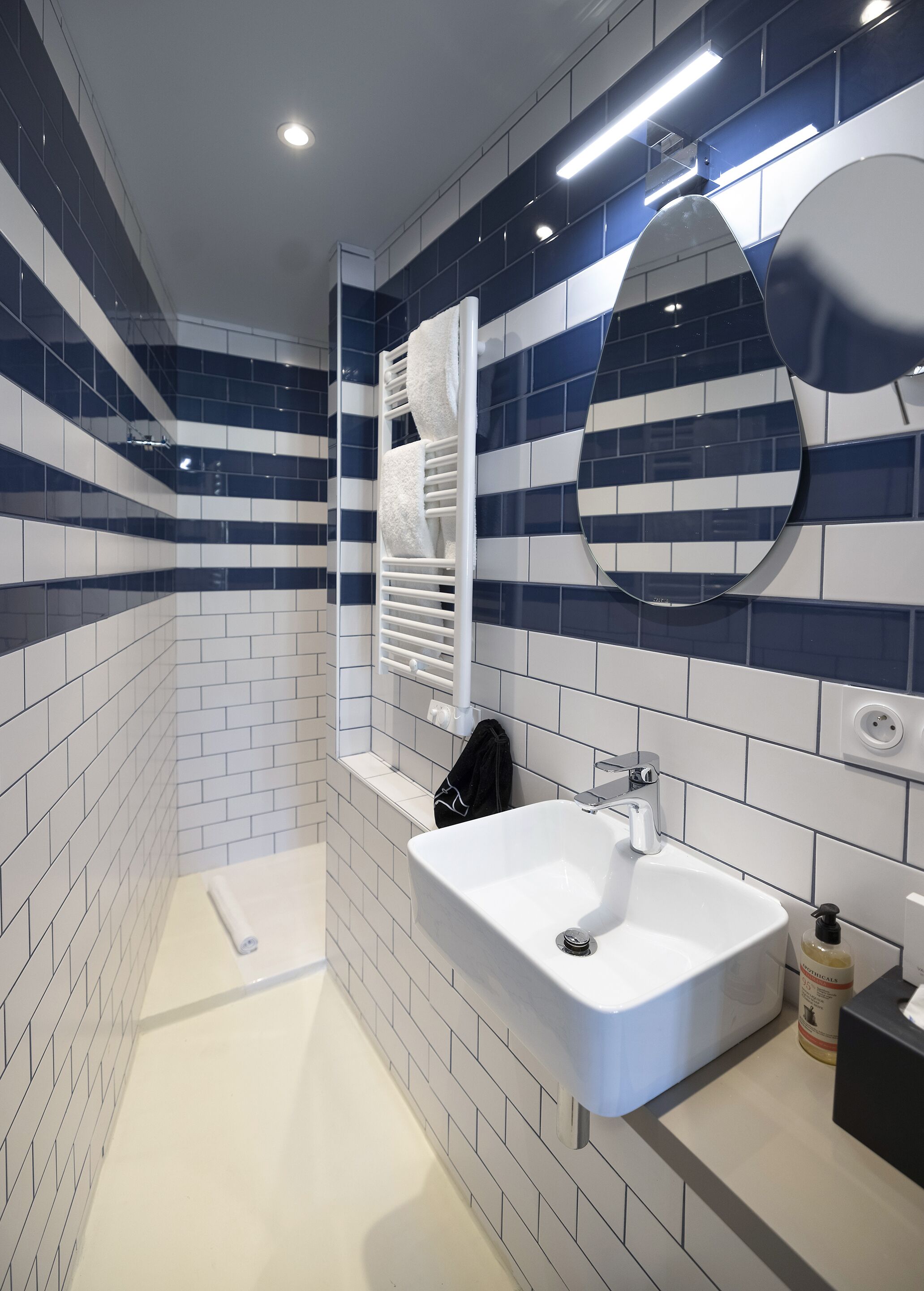 shower, hair dryer, bathrobes, slippers