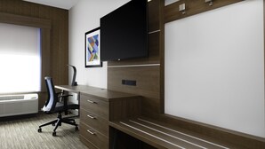 A modern office space with a desk, chair, and built-in TV. - Holiday Inn Express & Suites The Dalles by IHG (The Dalles)