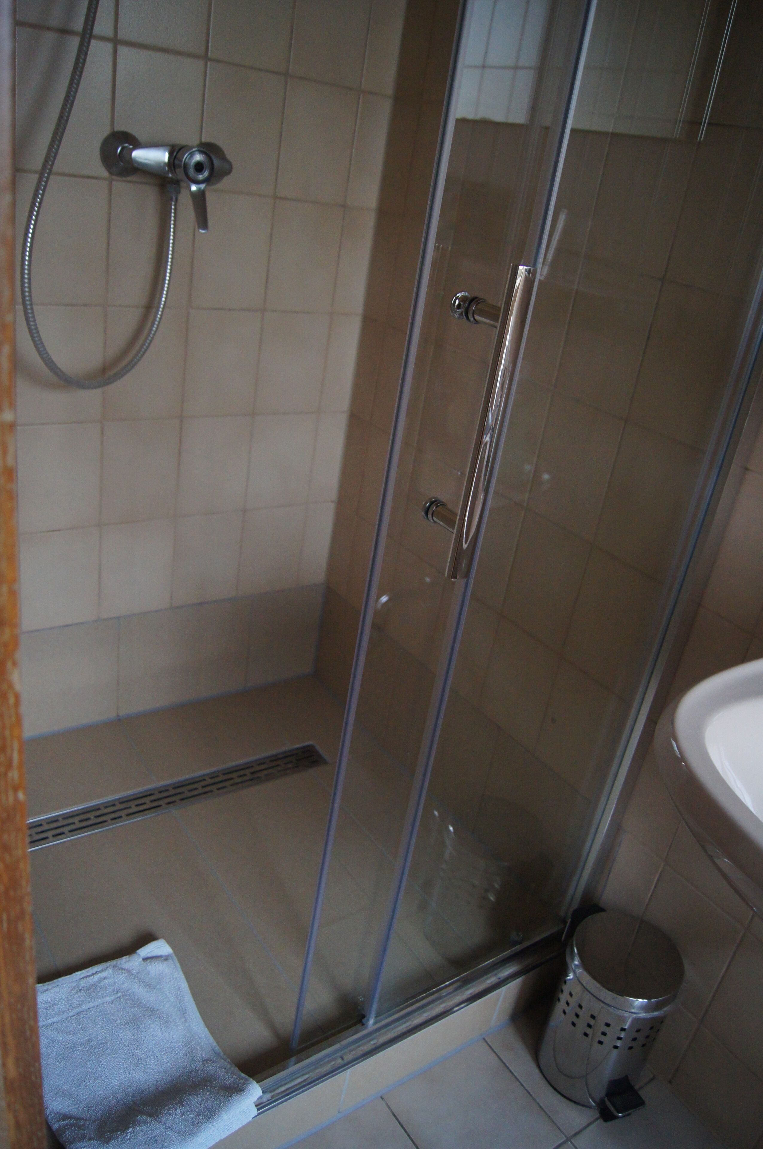 Shower, towels, soap, toilet paper