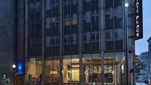 A modern building with a glass facade and a sign reading "Hyatt Place". - Hyatt Place Tulsa Downtown (Tulsa)