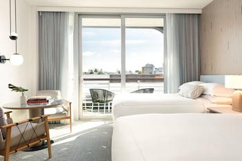 Premium bedding, minibar, in-room safe, desk at Kimpton Hotel Palomar South Beach by IHG