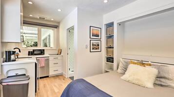 Desk, laptop workspace, iron/ironing board, Internet