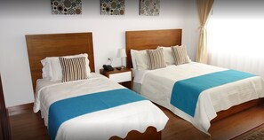 Double Room, Multiple Beds | Desk, free WiFi, bed sheets - Hotel Maceo Chico (Bogotá)