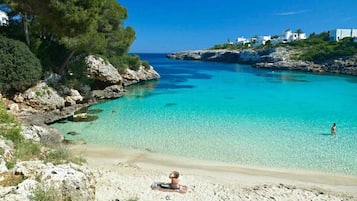 On the beach, sun-loungers, beach towels
