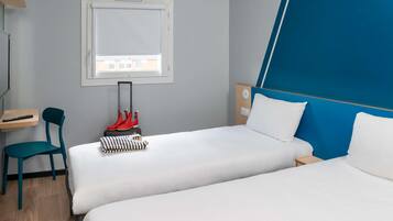 Værelse - 2 enkeltsenge | Lydisolering, gratis Wi-Fi, sengetøj