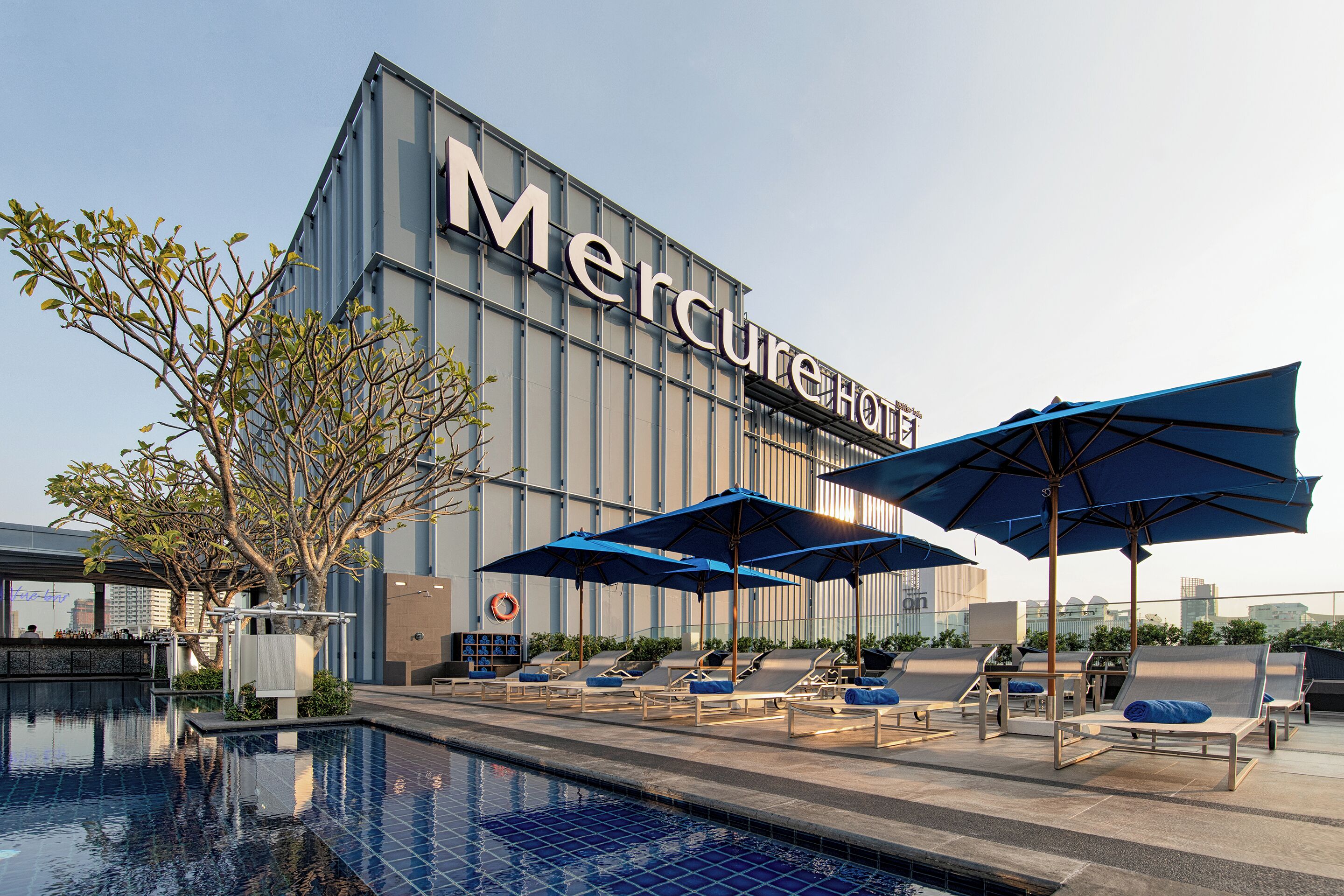 Outdoor pool, pool umbrellas, pool loungers