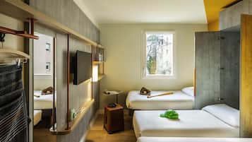 Triple Room, Multiple Beds | Individually furnished, laptop workspace, soundproofing, free WiFi