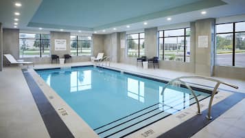 Indoor pool, open 7:00 AM to 11:00 PM, sun loungers