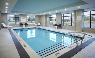 Indoor pool, open 7:00 AM to 11:00 PM, sun loungers