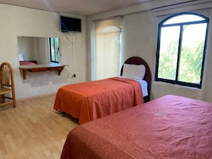 Family Room, 4 Bedrooms | Desk, laptop workspace, blackout drapes, iron/ironing board - Hotel Real Del Lago (Tlaxcala)