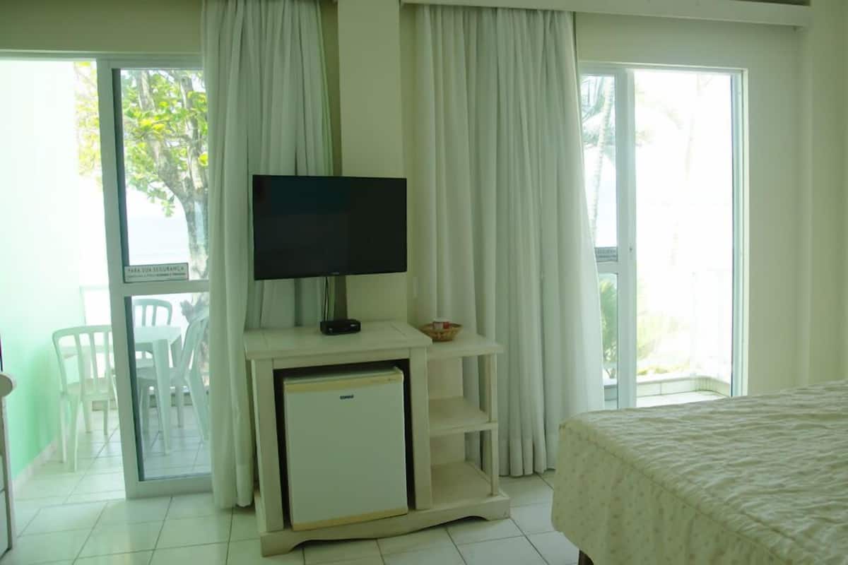 Habitación cuádruple Confort | Minibar, cortinas blackout, wifi gratis y ropa de cama