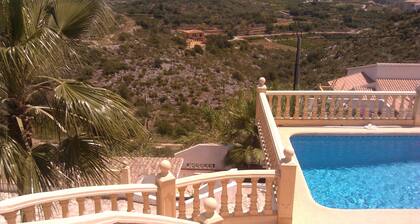 At the edge of a nature reserve, detached villa with pool & view of sea