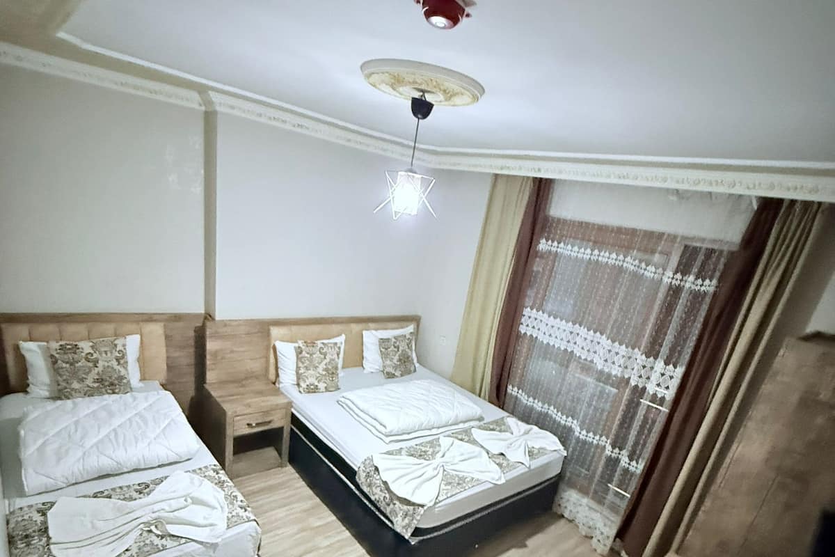 Family Room, Garden View | Individually decorated, individually furnished, desk, laptop workspace