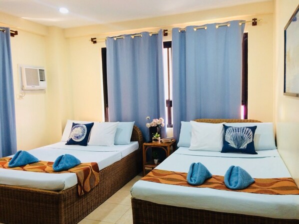 Basic Quadruple Room, Non Smoking, Mountain View | In-room safe, desk, laptop workspace, soundproofing - Crystal Bay boutique hotel (El Nido)