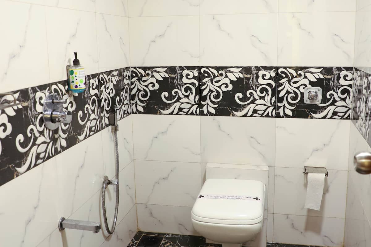 shower, designer toiletries, towels, soap