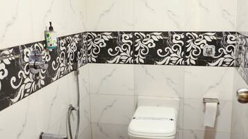 Shower, designer toiletries, towels, soap