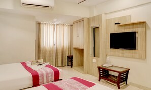 Executive Quadruple Room | Egyptian cotton sheets, premium bedding, in-room safe - Hotel Plaza Executive Kurla (Mumbai)
