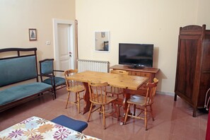 Triple Room, Shared Bathroom | Blackout curtains, iron/ironing board, free WiFi, bed sheets