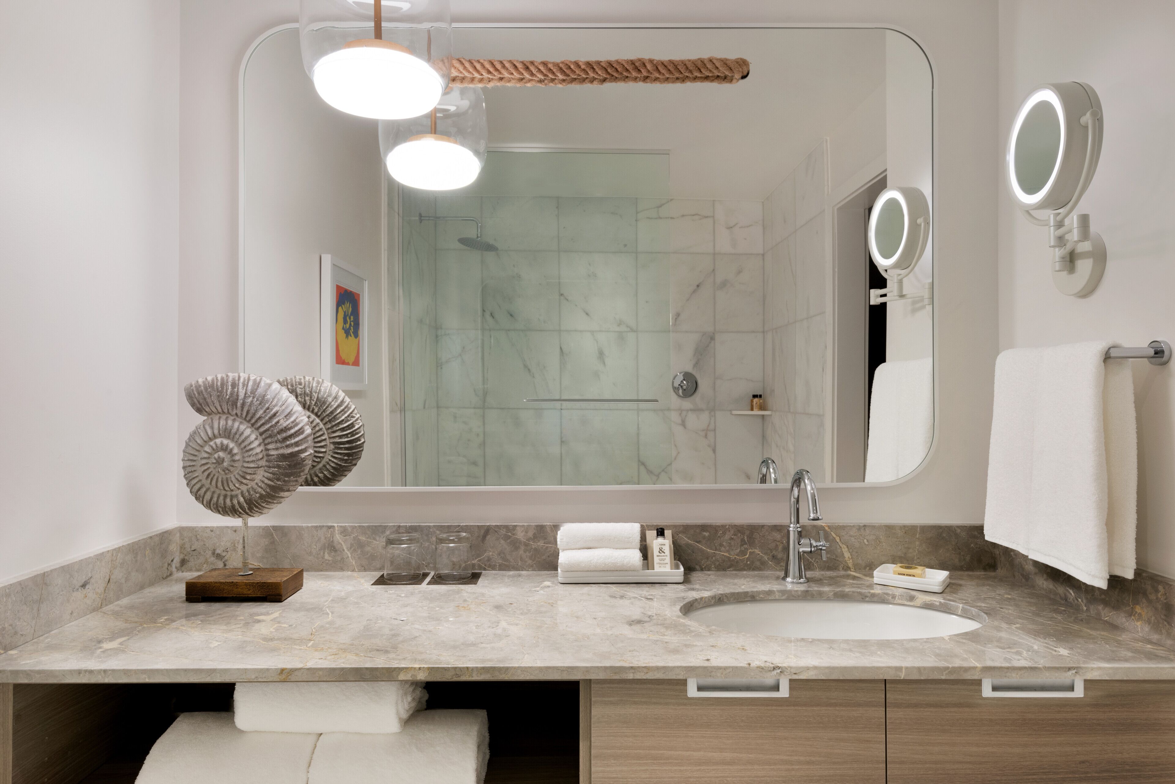 designer toiletries, hair dryer, bathrobes, towels