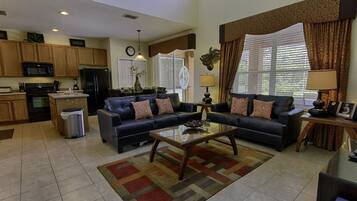 Flat-screen TV, video-game console, DVD player, table tennis