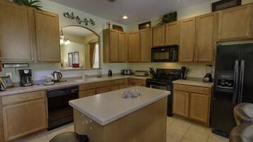 Fridge, microwave, dishwasher, cookware/dishes/utensils