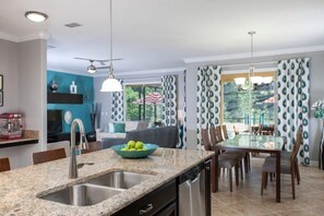 Fridge, dishwasher, cookware/dishes/utensils, dining tables