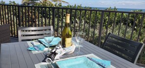 Outdoor dining - Escape to your HAPPY place, luxury corner condo right on the beach! (Jensen Beach)