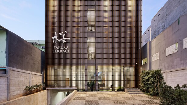 A modern building with a sign reading "SAKURA TERRACE". - Sakura Terrace Setiabudi (Jakarta)