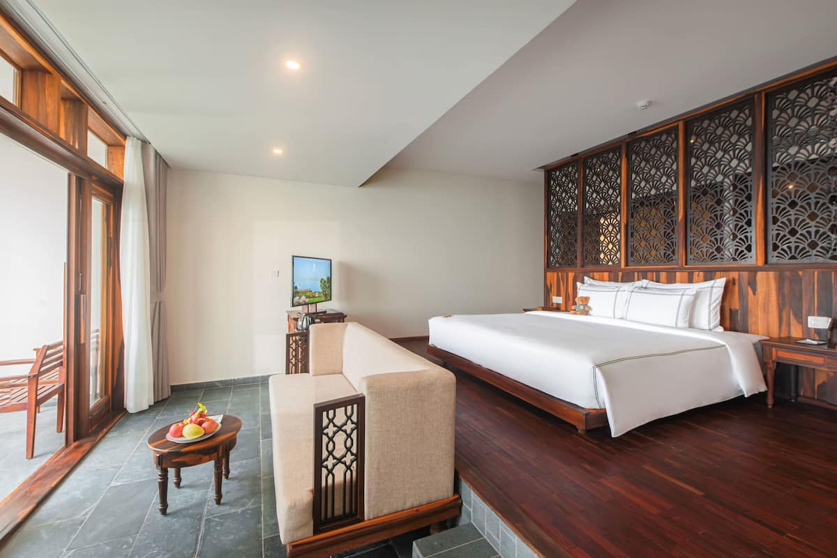 Quarto casal júnior, 1 cama King, vista para o oceano | 1 quarto, frigobar, cofres nos quartos, escrivaninha