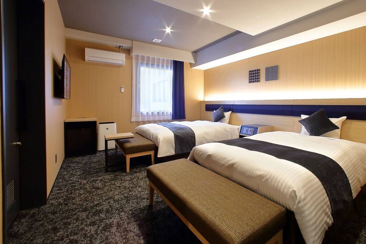 Kamar Twin Deluks | Brankas, setrika/meja setrika, Wi-Fi gratis, dan seprai linen