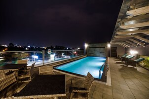 Outdoor pool, open 7:00 AM to 7:00 PM, sun loungers