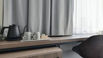 Desk, blackout curtains, free WiFi, bed sheets