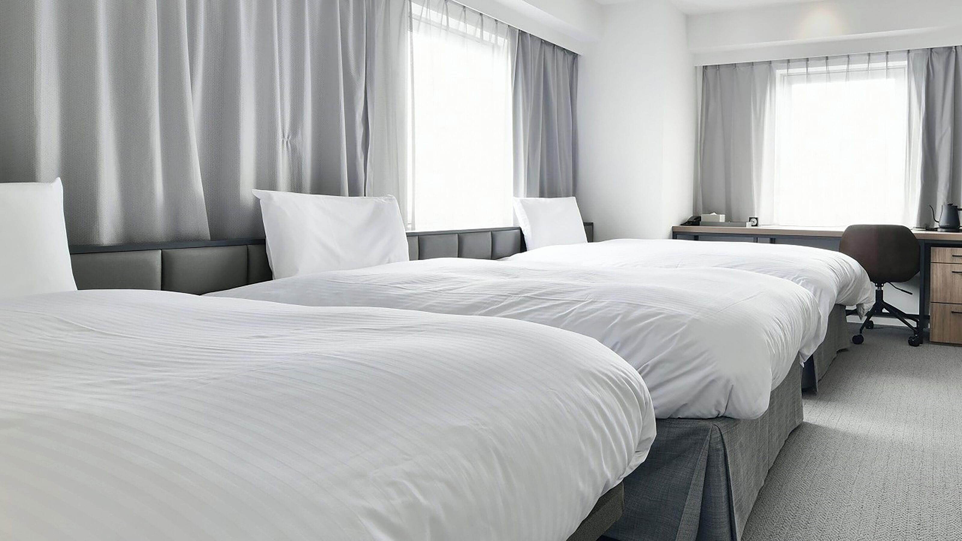 deluxe twin with 1 extra bed | 1 bedroom, desk, blackout curtains, free wifi