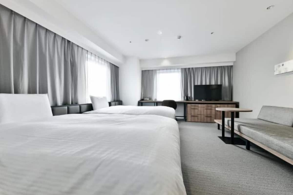 Desk, blackout curtains, free WiFi, bed sheets
