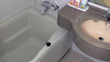 Separate bathtub and shower, free toiletries, hair dryer