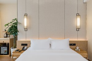 Executive tweepersoonskamer | Een minibar, een bureau, verduisterende gordijnen, gratis wifi