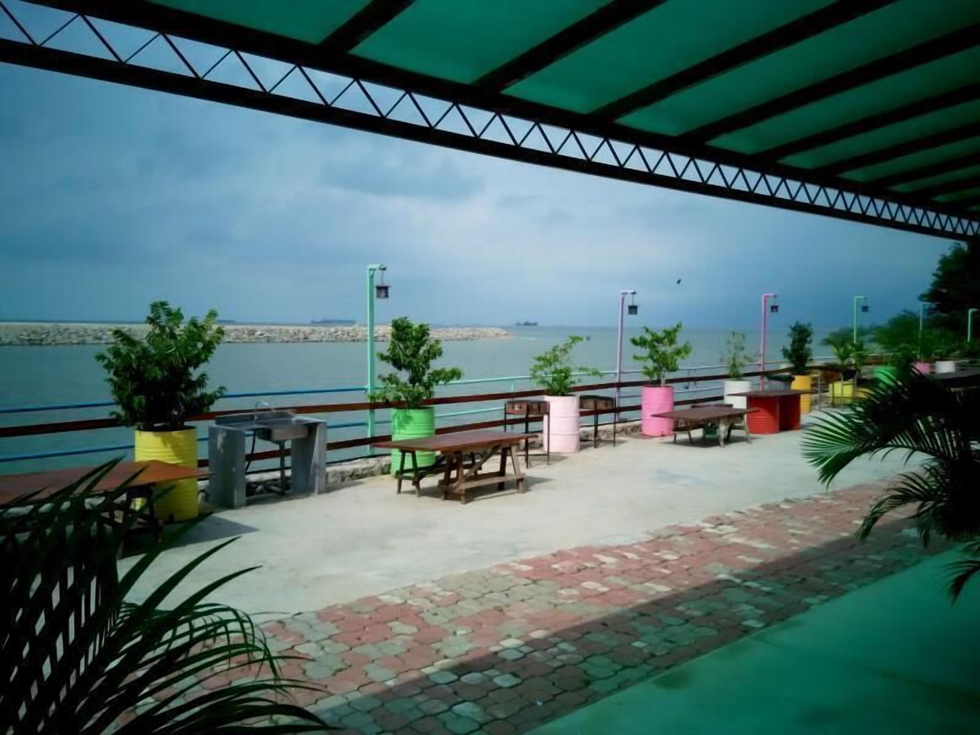 Deluxe tweepersoonskamer, uitzicht op zee | Uitzicht op de binnenplaats