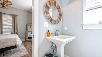 Combined shower/tub, hair dryer, towels, soap