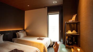 Chambre Ăconomique avec lits jumeaux | Espace de travail pour ordinateur portable, Wi-Fi gratuit, draps fournis