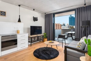 Appartement Confort | Aire de séjour | Téléviseur à écran plat, Netflix, services de diffusion en continu