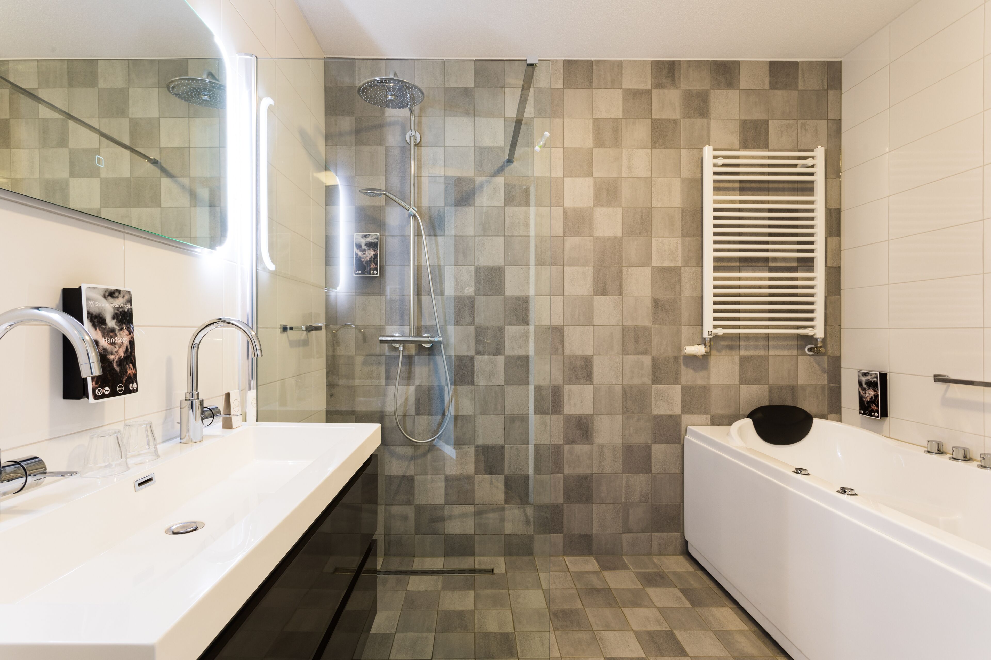 deluxe suite | bathroom | free toiletries, hair dryer, bathrobes, slippers