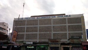 A building with a sign stating "LUB PRESTIGE ACCOMMODATION AVAILABLE". - Prestige Hotel & Club Nyeri (Nyeri)