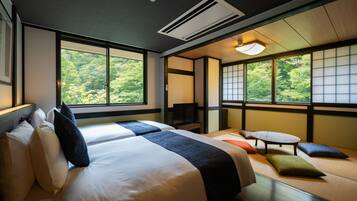 Superior Family Room with Private Bathroom, Non Smoking | In-room safe, iron/ironing board, free WiFi, bed sheets